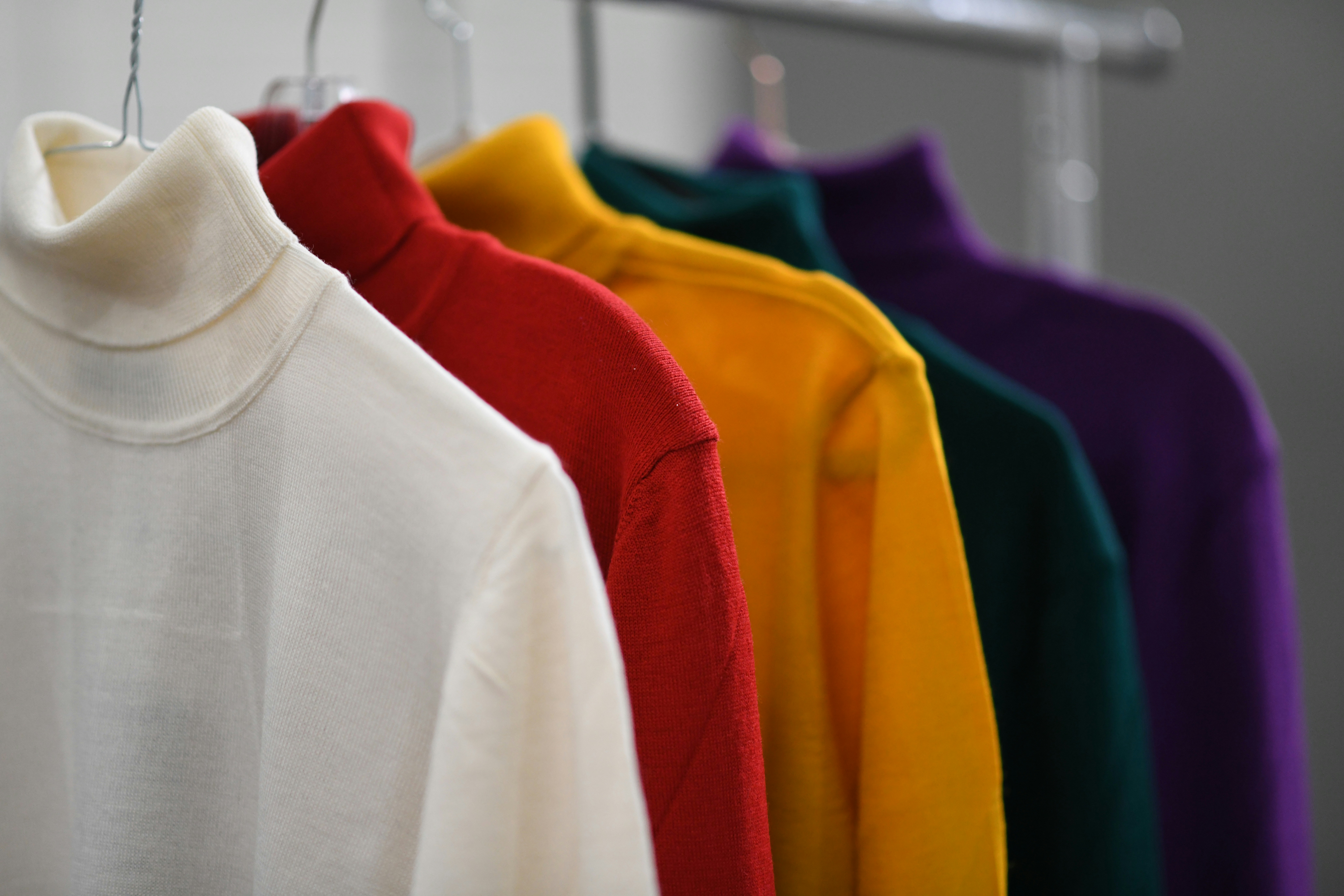 sweaters in a small closet