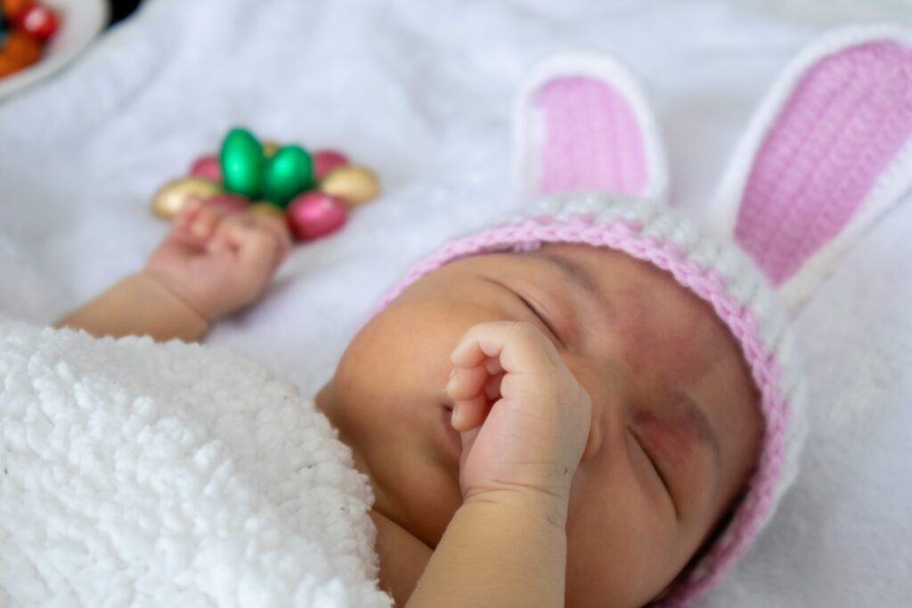infant wearing easter bunny hat