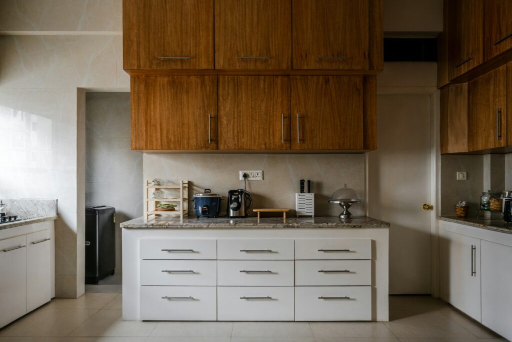 kitchen cabinets with appliances on them