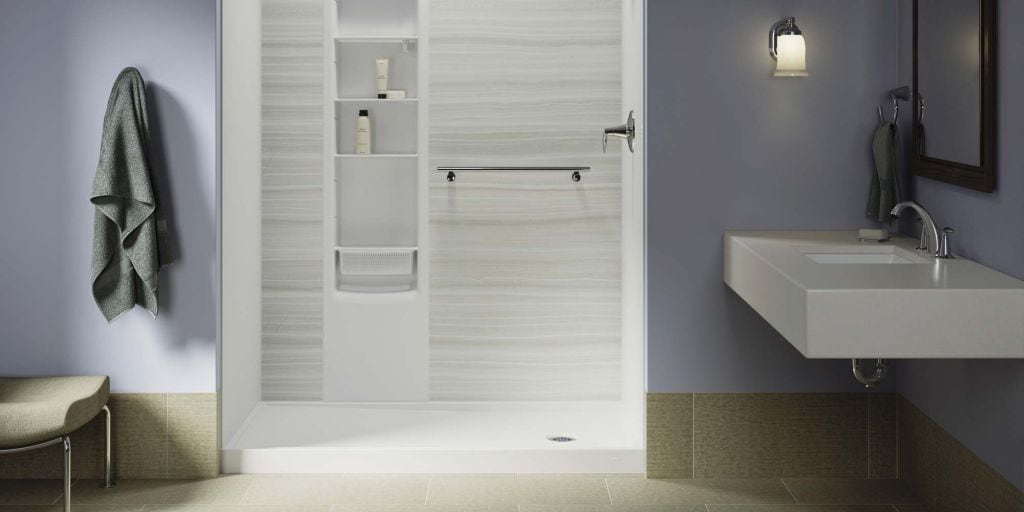 Kohler LuxStone shower with floating shelf and shower storage locker