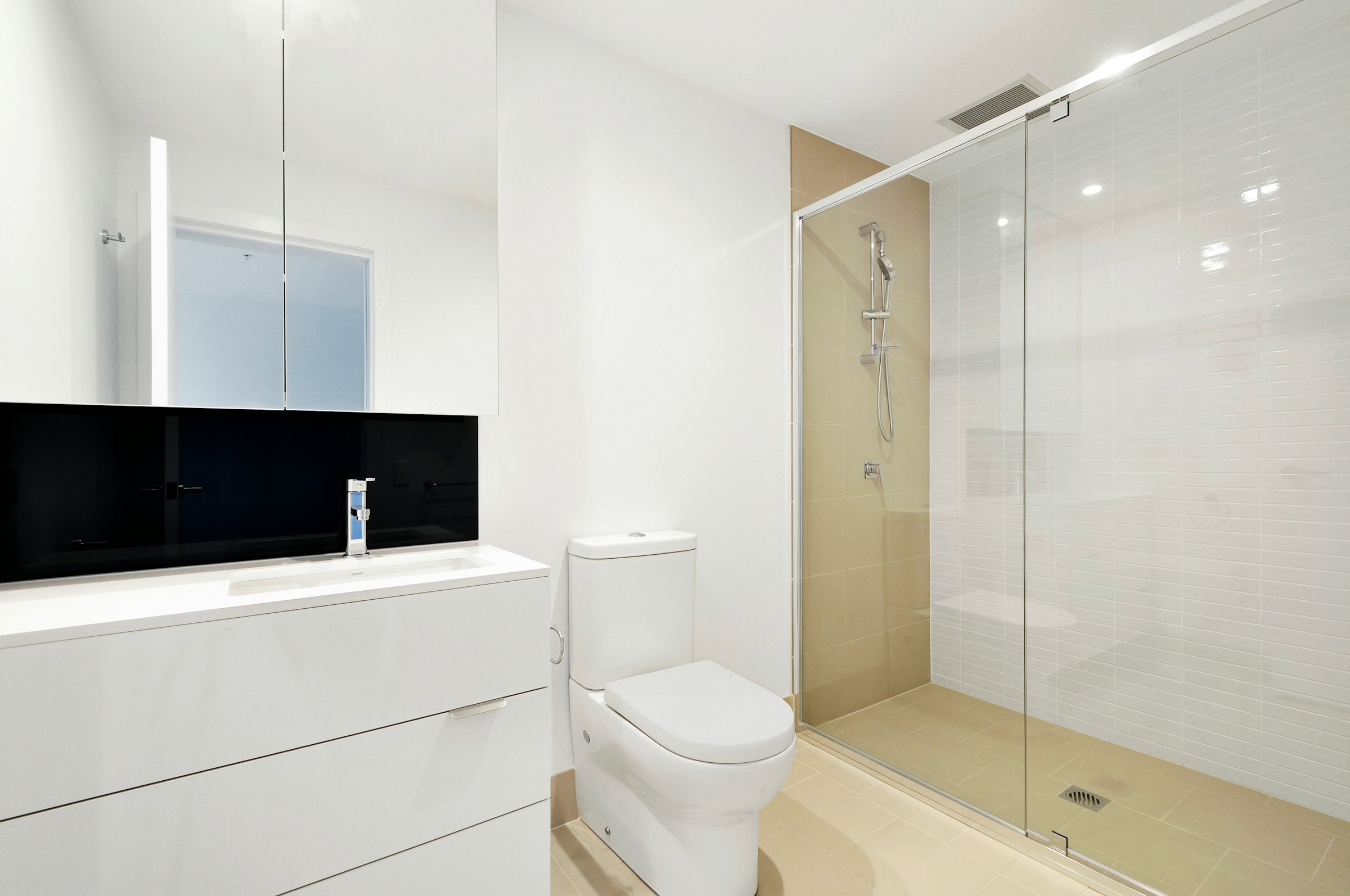 high contrast accessible bathroom|||well-lit bathroom