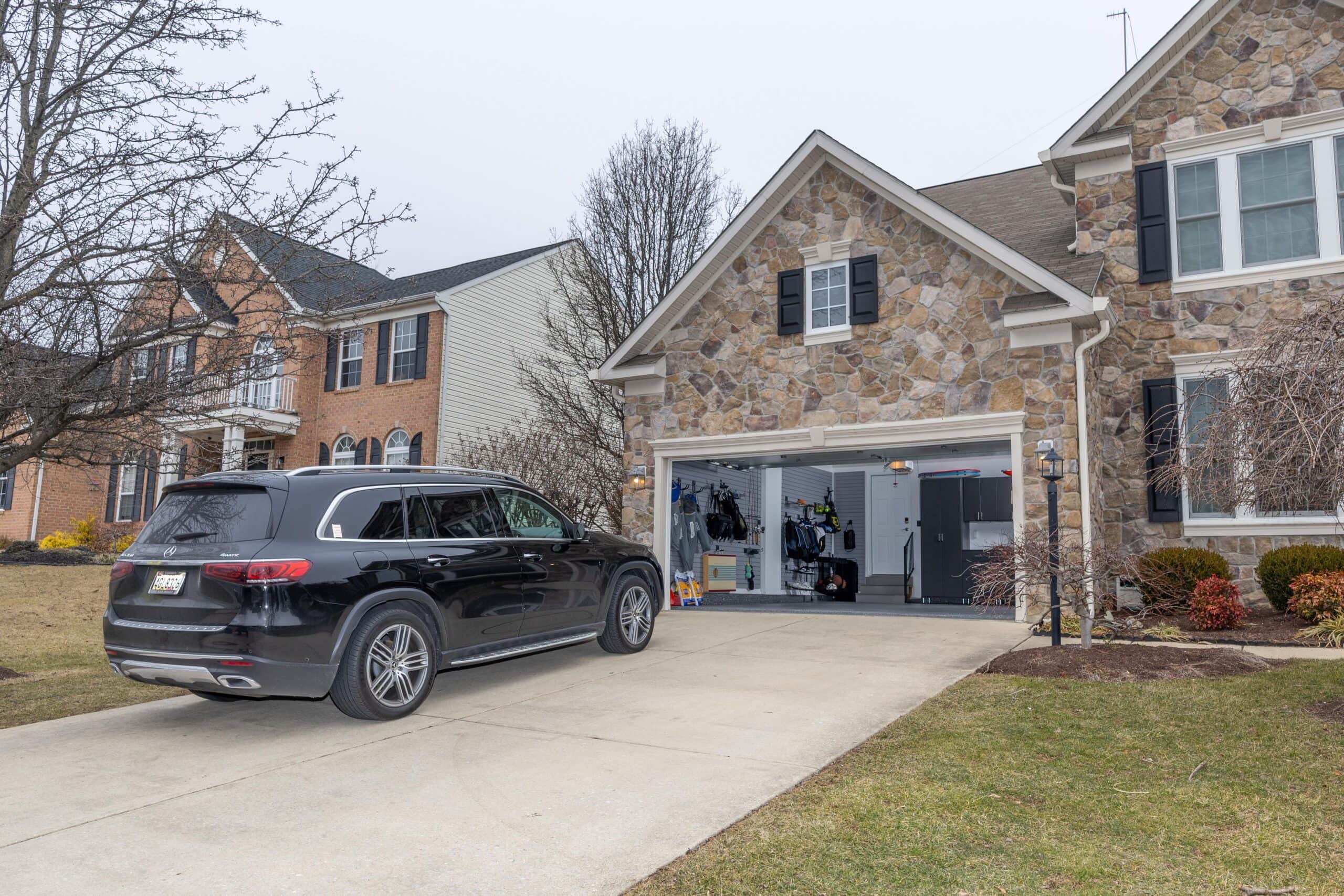 Charlotte home with garage open